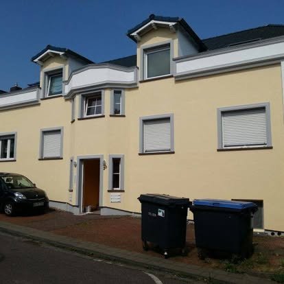 Fassadenarbeiten an einem Stadthaus